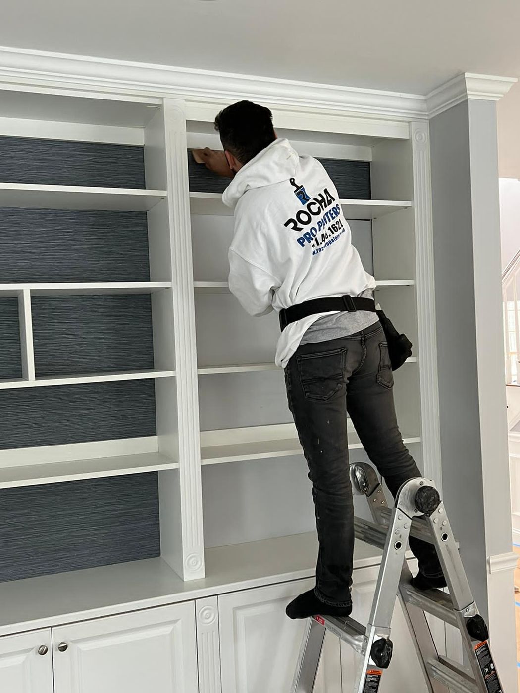 Rocha Pro Painters painter finishing built-in shelving